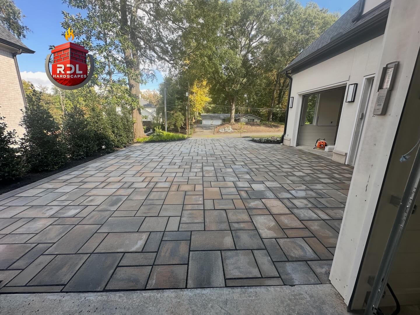 Modular paver driveway in slate and charcoal tones